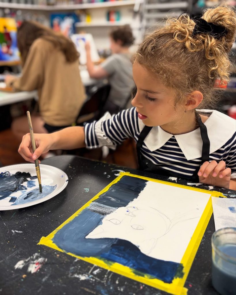 Children painting during an art class at Vivo Art Studio in Palm Coast, Florida.