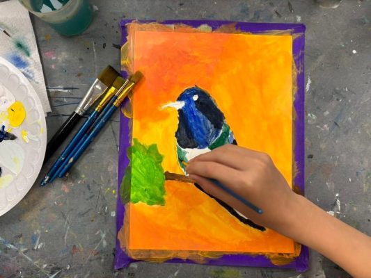 Children painting and drawing during an art class at Vivo Art Studio in Palm Coast, Florida.