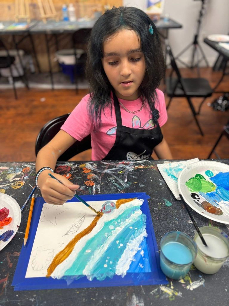 Children painting and drawing during an art class at Vivo Art Studio in Palm Coast, Florida.