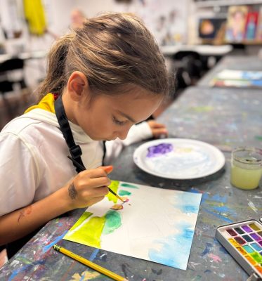 Children painting and drawing during an art class at Vivo Art Studio in Palm Coast, Florida.