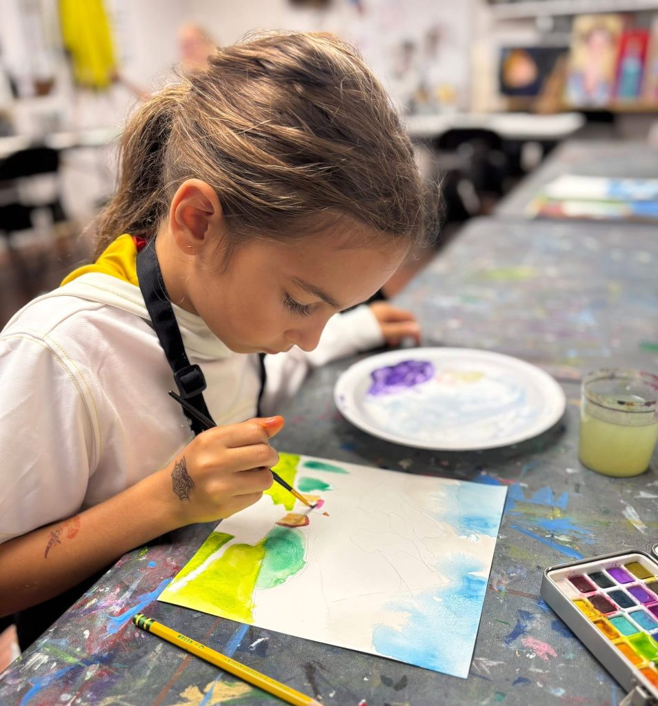 Children painting and drawing during an art class at Vivo Art Studio in Palm Coast, Florida.