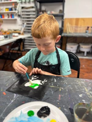 Children painting and drawing during an art class at Vivo Art Studio in Palm Coast, Florida.