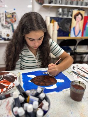 Children painting and drawing during an art class at Vivo Art Studio in Palm Coast, Florida.