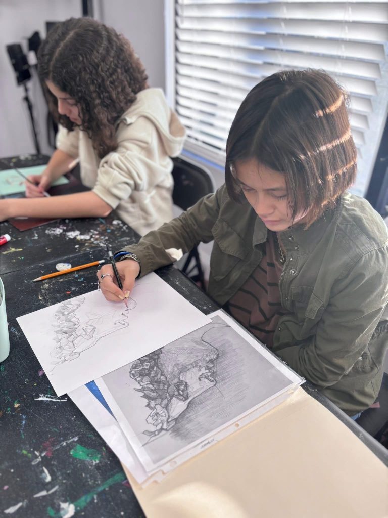 Children painting during an art class at Vivo Art Studio in Palm Coast, Florida.