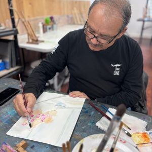 Adults painting and drawing during an art class at Vivo Art Studio in Palm Coast, Florida.
