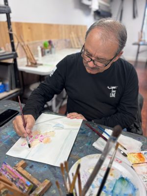 Adults painting and drawing during an art class at Vivo Art Studio in Palm Coast, Florida.