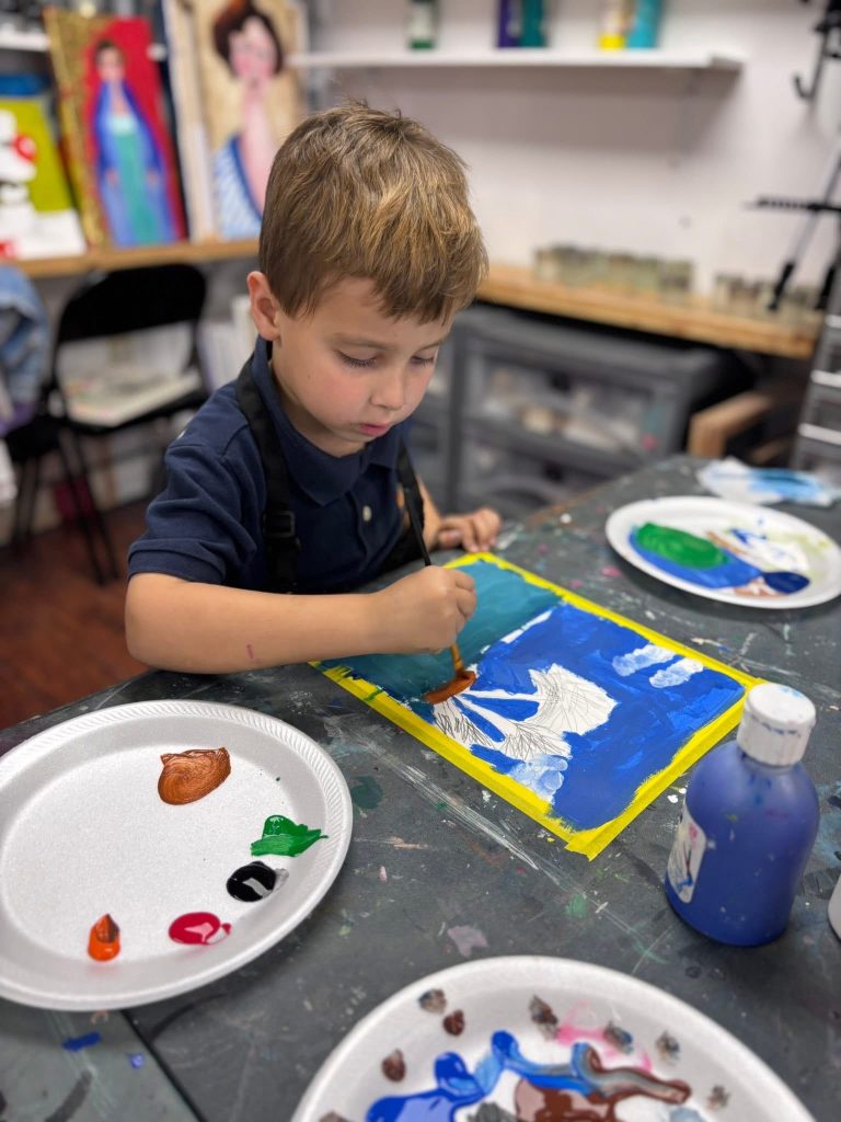 Children painting and drawing during an art class at Vivo Art Studio in Palm Coast, Florida.
