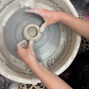 Children working on a pottery and sculpture art project at Vivo Art Studio in Palm Coast, Florida.