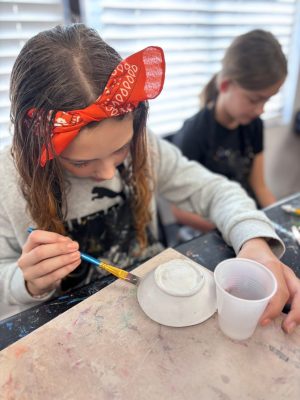 Children working on a pottery and sculpture art project at Vivo Art Studio in Palm Coast, Florida.